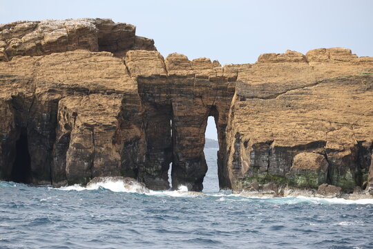 Natural arch on the Madalena Islands- Ileum Deitado -between Pico and Faial, Azores, Portugal  
