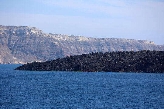 View of the caldera with lava island Nea Kameni the Cycladic island of Santorini-Greece  