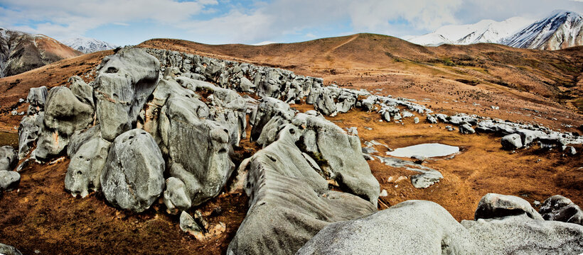 Expansive panorama of ancient limestone boulders in New Zealand