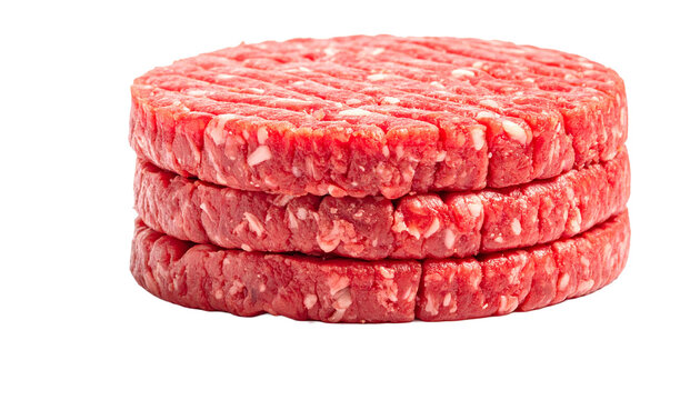 Stack of three raw beef burger patties isolated on a white background ready for grilling