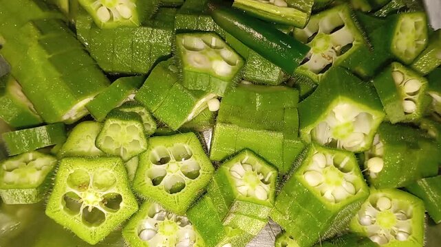Top-Down Macro Shot of Freshly Sliced Green Okra and Chilies