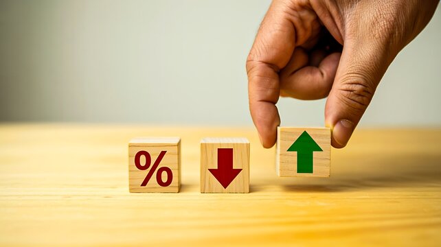 Financial market concept with hand adjusting percentage indicators for changing rates and business growth