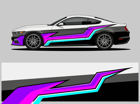 Modern sports car with vibrant geometric decal design.