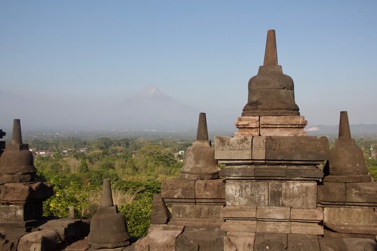 Borobudur Temple Stupas with Mount Merapi in the Background