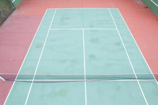 Hard court surface with white boundary lines The Concept of sports precision