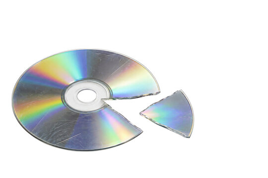 Broken compact disc with scattered shard on transparent background