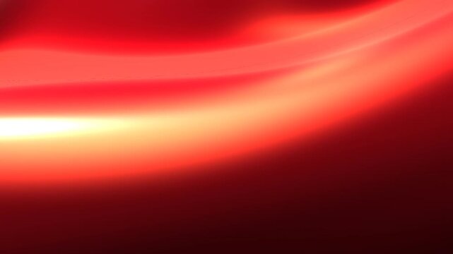 Red liquid satin ribbon gracefully flowing with luminous crest undulations for luxury commercial backgrounds