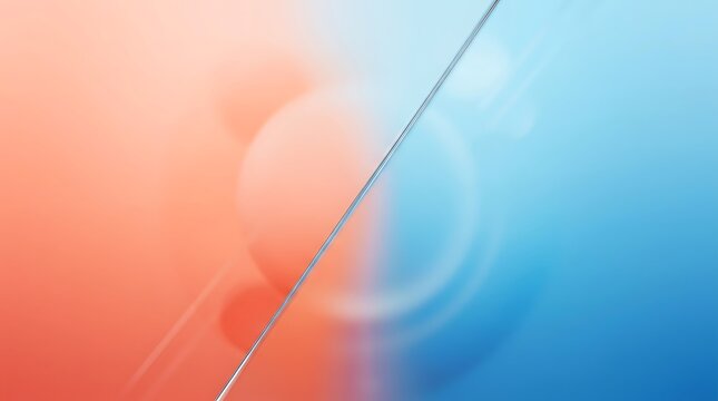 Abstract background with soft gradient transition between warm orange and cool blue colors.