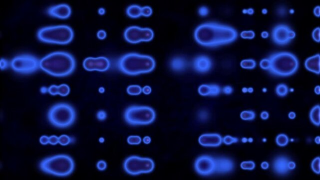 Blue blurred lights merging and splitting like cell division seamless looped background