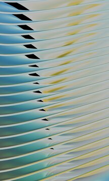 Layered teal 3D fins with black notches and yellow tints