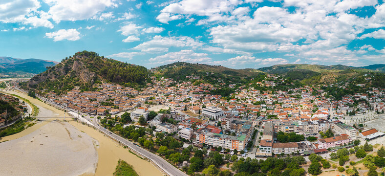 Aerial Panorama of Berat Albania with Shallow River and Hills