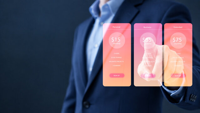 pricing, table, compare, plans, monthly, Business hand selecting digital pricing table with plan comparison, showing free, basic, pro, and business tiers for online service or subscription management.