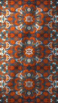 ​A seamless repeating pattern featuring a complex symmetrical design with intricate orange, grey, and blue geometric and lace-like elements, perfect for detailed surface and textile designs.