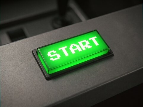 Glowing Green Start Button With Pixelated Text