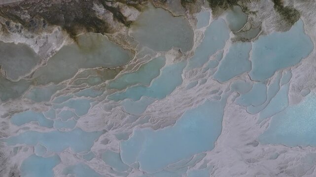 Aerial view of breathtaking natural site of white travertine thermal terraces, Pamukkale, T&uuml;rkiye	
