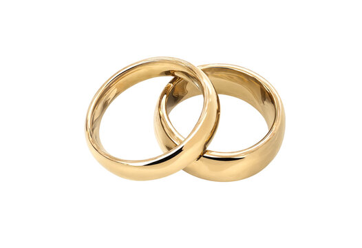 Two gold wedding rings placed together on clean white background