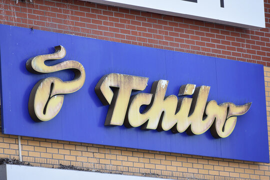 Tchibo signage, logo, emblem in the coffee retail shop at Sadyba shopping mall. WARSAW, POLAND - APRIL 28, 2026