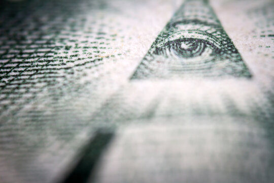 Macro close up of United States one dollar bill. American dollar background. Detailed dollars money texture. Selective focus, shallow depth of field