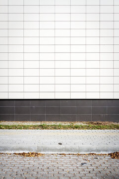 Modern white panel tile wall texture background. Architectural detail.