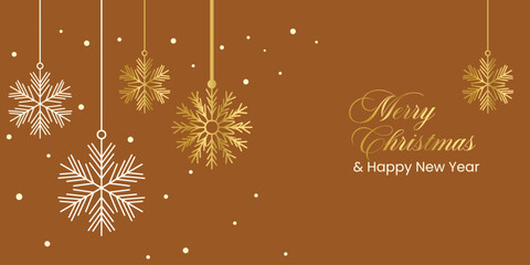Golden snowflakes hanging on a brown background with holiday greetings © Muhammad