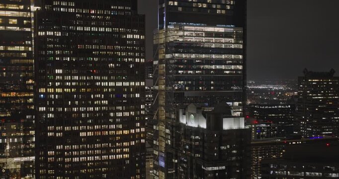 Philadelphia Pennsylvania Aerial v125 low tracking flyover Benjamin Franklin Pkwy capturing downtown cityscape at night with illuminated towering skyscrapers - Shot with 8k Camera - Sept 28th 2023
