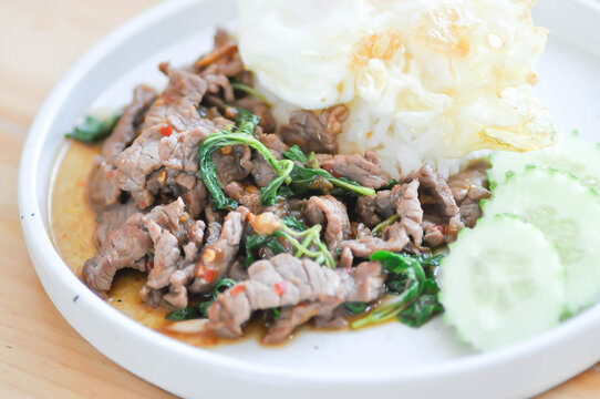 stir fried beef with basil or stewed beef or basil beef with rice and fried egg