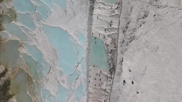 Aerial view of breathtaking natural site of white travertine thermal terraces, Pamukkale, T&uuml;rkiye	
