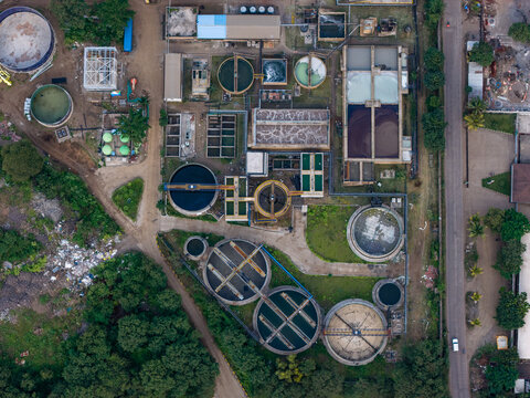 Aerial view of the Remondis ETP Plant featuring circular treatment tanks and industrial infrastructure surrounded by greenery in Chakan, Maharashtra, India.