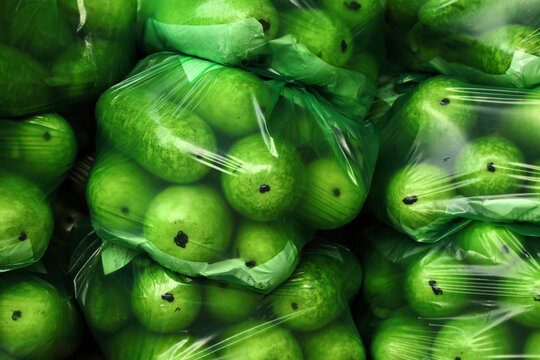 Fresh Green Winter Melons Packaged in Plastic Bags