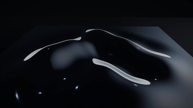 Glossy black fluid dynamic wave moving smoothly with polished silver highlights in dark cinematic studio environment sequence