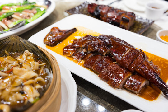 Variety of delicious dishes on restaurant dining table