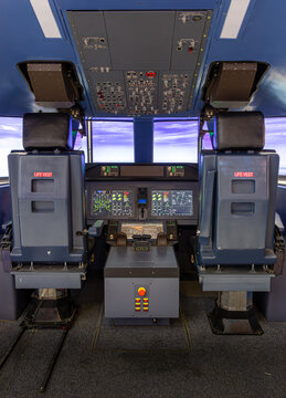 Professional airliner flight simulator cabin used for pilot training, flight simulation and aviation education.