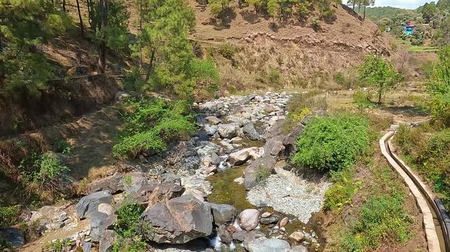 Rocky Mountain Stream with Irrigation Canal for Hillside Farming