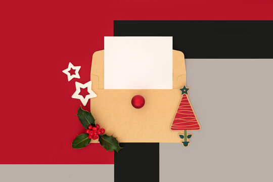 Surreal Christmas mail art design with envelope and blank letter, traditional symbols of holly, stars Xmas tree gift tag on geometric background. 