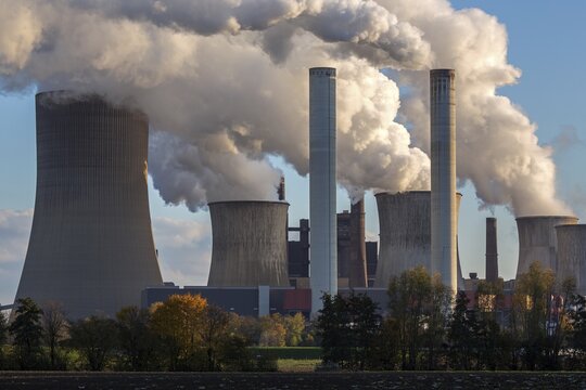 RWE Power AG, Niederaussem power plant, lignite-fired power plant, steaming chimneys, coal exit, Bergheim, Rhenish lignite mining area, North Rhine-Westphalia, Germany