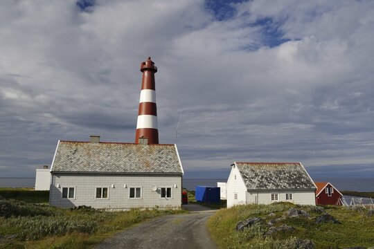 The world's northernmost lighthouse and a gravel road, barren landscape, Arctic Sea, Gamvik, Slettnes, Arctic, Lapland, Finnmark, Norway