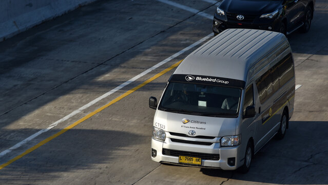 High angle shot of a metallic silver Toyota Hiace Commuter from Cititrans transport company