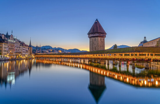 Lucerne, Switzerland with the Chapel Bridge and water tower over the River Reuss at dawn 409