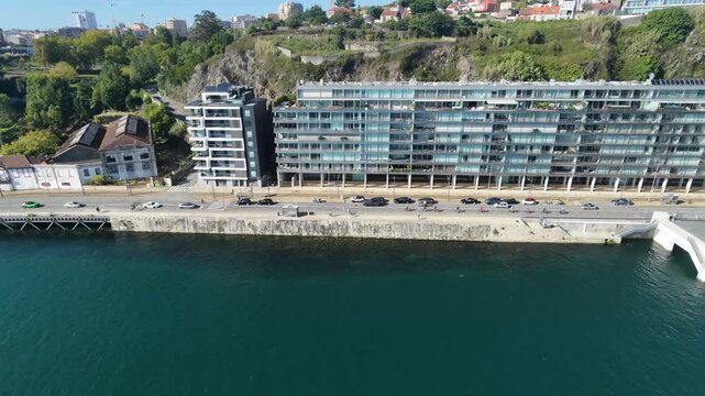 building by the river Porto Douro drone