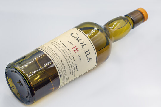 Caol Ila 12 year Islay whisky bottle closeup on white.