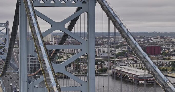 Philadelphia Pennsylvania Aerial v211 zoomed low flyover around Benjamin Franklin Bridge capturing Old city and downtown cityscape against an overcast sky - Shot with 5k Camera - Sept 29th 2023