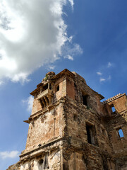 Ancient ruined stone tower and jharokha balcony of Rana Kumbha Palace at Chittorgarh Fort, Rajasthan, India © Frames of Mind