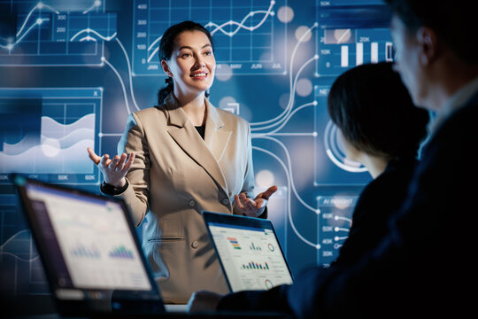 Confident Businesswoman Presenting Data Science Insights with Futuristic Network Visualization