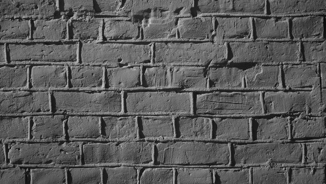Gray background, photo of brickwork texture of gray brick wall
