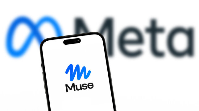 Smartphone Displaying Muse App Logo with Blurred Meta Corporation Logo Background