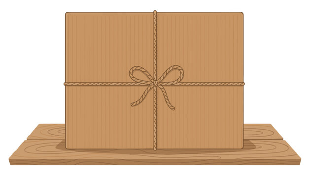 Cardboard shipping box tied securely with twine rests on a textured wooden surface against a white backdrop.