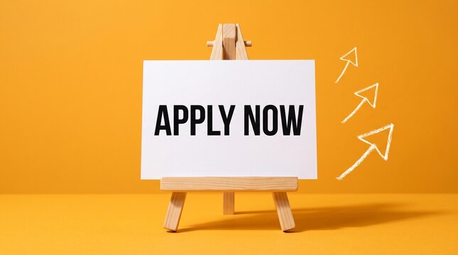Apply now sign on easel with upward arrows