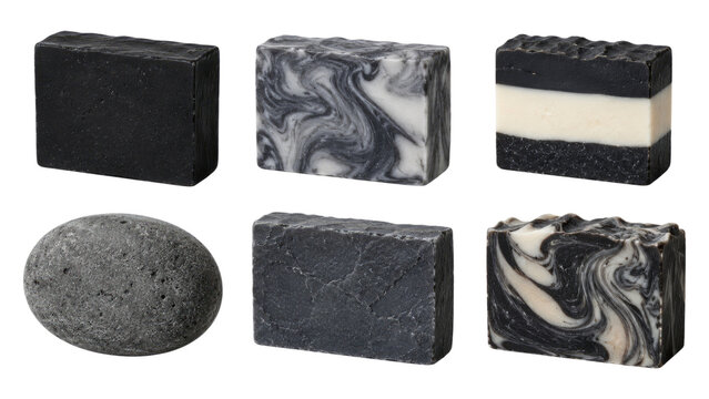 Six dark and marbled charcoal soap bars and a textured pumice stone arranged on a transparent background