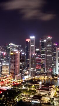 Time lapse of the Singapore skyline at night. Vertical video.