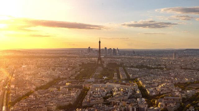 Sunset time Lapse looking out towards the Eiffel Tower and the city of Paris France.